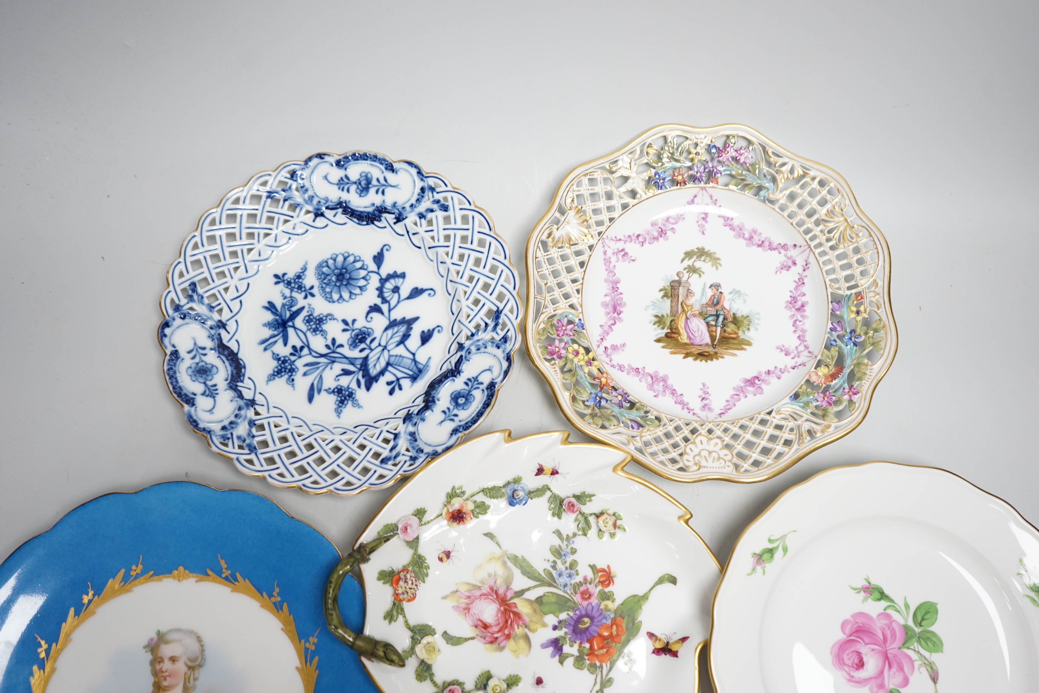 Six Continental plates by Meissen, Dresden, Sevres, etc. including Sevres Comtesse Dubarry portrait, two Meissen plates with pierced edges, two outside decorated, widest 23.5cm